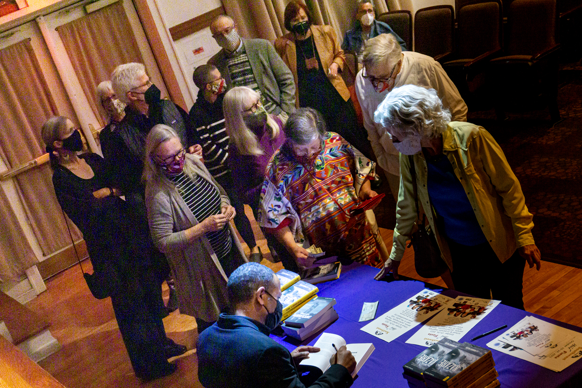 book-launch-signing-line_credit-bruce-bloy-1